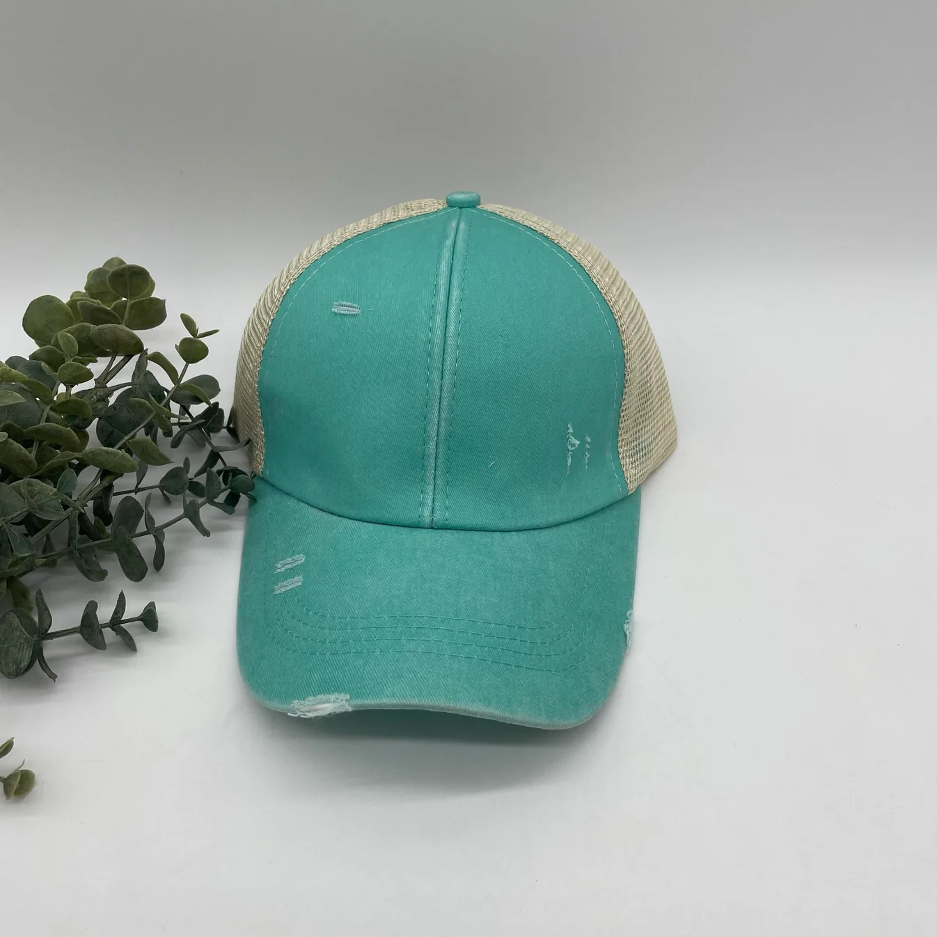 Distressed Criss-Cross Ponytail Trucker Cap – Light Teal