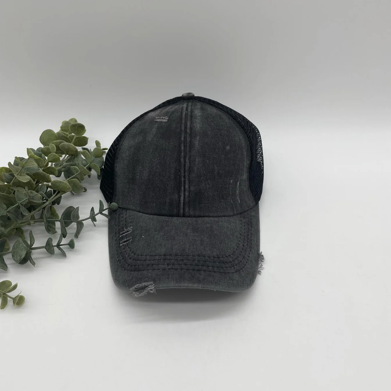 Distressed Criss-Cross Ponytail Trucker Cap – Washed Black